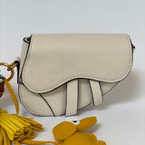 Bolso para niñas estilo Saddle color Hueso