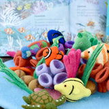 Tapete de juego de lana del coral de arrecife