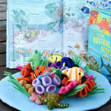 Tapete de juego de lana del coral de arrecife