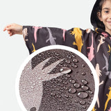 Impermeable para niñxs Negro de Ajolotes