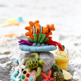 Juguete de coral de arrecife con pez payaso