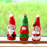 Muñecas "peg dolls" de madera vestidas Santa Claus, señora Claus y duende