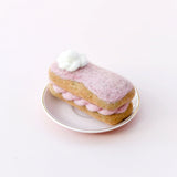 Éclair de fresa de fieltro de lana