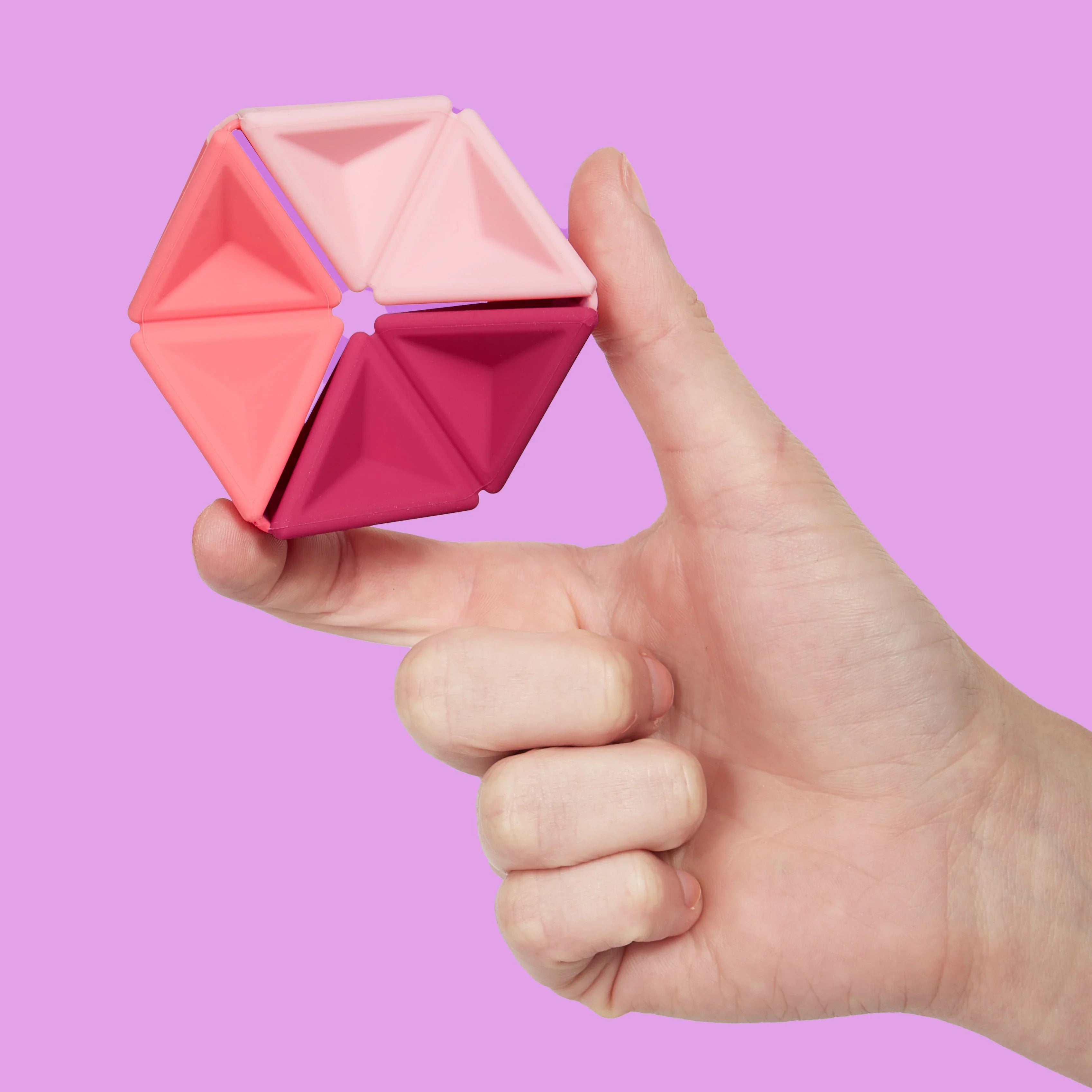 Speks Pivot Magenta en mano