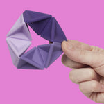 Speks Pivot Violet en mano